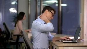 The Effects Of Technology Man Rubbing Sore Neck